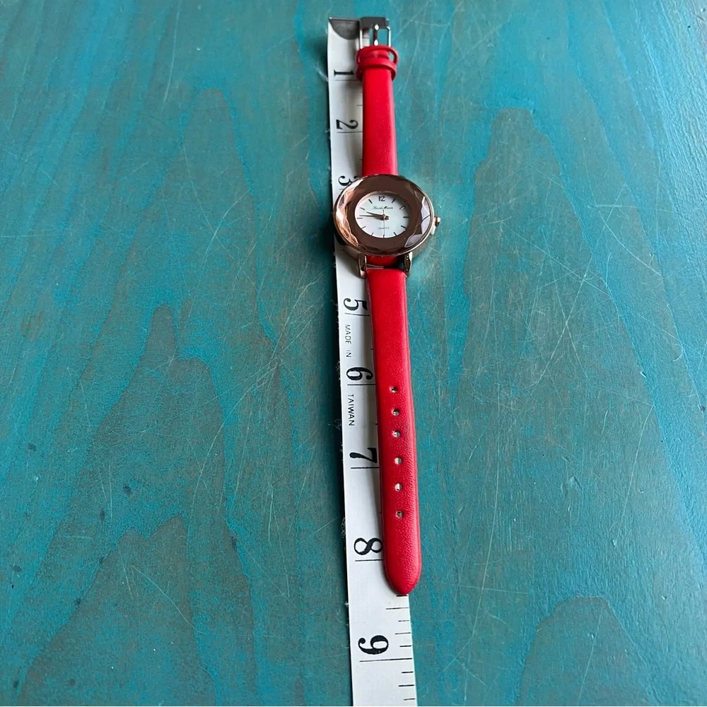 Kaidi Mann ladies rose gold tone red watch NEW BATTERY